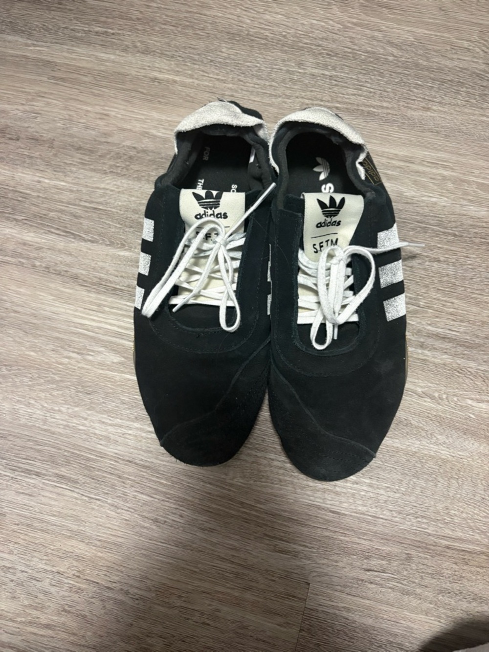 adidas Women’s Black & White Classic Suede Sneakers